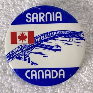 5/$35 Vintage White Blue Sarina Canada Pin Back Button Badge